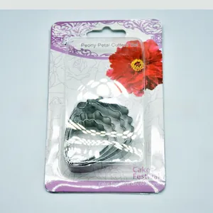 Macro view of 4-piece stainless steel peony petal cutters set in retail packaging