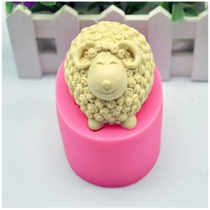 Pink silicone mold and white sheep figure for handmade soap and candle crafts