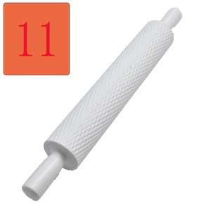 Close-up of white plastic embossing rolling pin with diamond grid pattern for fondant