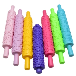 7-piece colorful textured fondant rolling pins with various embossed floral patterns