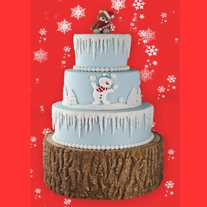 Three-tier Christmas silicone mold featuring snowman, pine trees, and a bear on a wood base