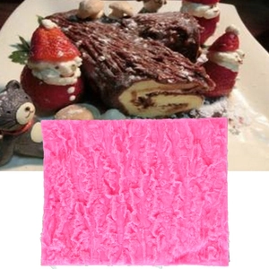 Detailed pink silicone mold with realistic tree bark texture for DIY fondant cake decorating
