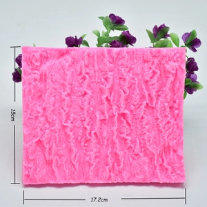 Pink silicone fondant mold with natural bark texture measuring 15cm by 17.2cm for cake decor