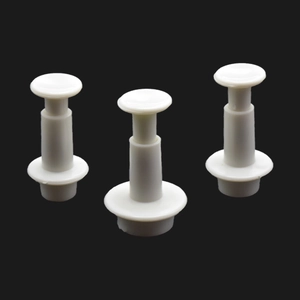 Detail of 3pcs white geometric plunger cutters with spring handles for fondant and cookies