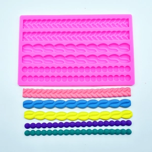 Pink silicone gemstone mold with braided and beaded textures for DIY fondant cake decor