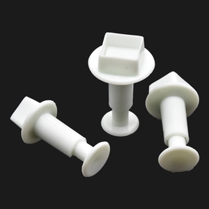 Three-piece set of white plastic square plunger cutters for fondant and cookie dough