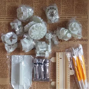 Macro shot of 4pcs fondant plungers and multiple cake decorating sculpting tools