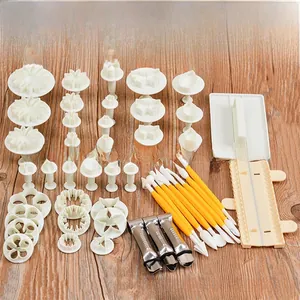 Detailed top view of 46-piece DIY baking set with plunger cutters and fondant tools