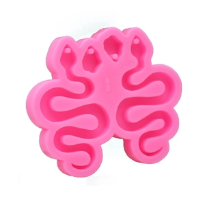 Pink silicone Medusa snake keychain mold for DIY resin casting and jewelry crafts