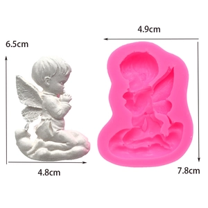 Macro detail of angel silicone mold for DIY plaster crafts and sleeping baby sculpture