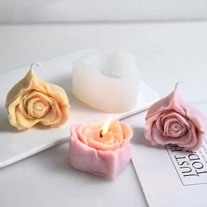 3D rose heart silicone mold with finished handmade candles in soft pink and yellow