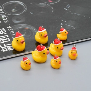 Resin Christmas yellow duck pendants with red hats for DIY earring necklace crafts