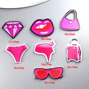 Pink and purple acrylic charms set featuring lipstick, handbag, sunglasses, and bikini