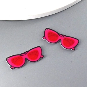 Detail of pink cat-eye sunglasses acrylic pendants for DIY jewelry and earrings