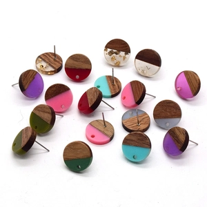 Handmade round resin and wood stud earrings with gold foil accents in various colors