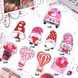 Nine styles of Valentine wooden pendants featuring heart trucks, gnomes and envelopes