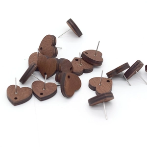 Vintage heart shaped dark wood earrings with stud backings and natural wood grain