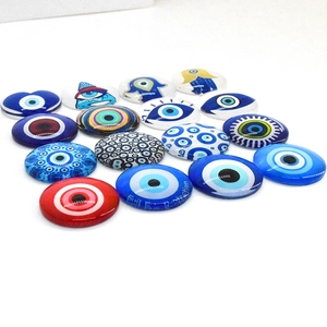 Cabochon in vetro malocchio in forme tonde e a cuore per la creazione di gioielli fai da te
