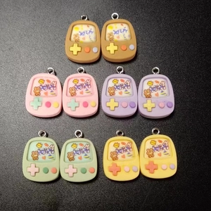 Set of colorful resin retro handheld game console charms with mini bear and rabbit designs