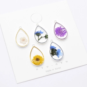 Handmade teardrop resin pendants with dried flowers and gold silver alloy borders