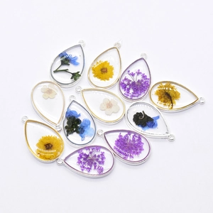 Teardrop resin pendants with real dried flowers and silver alloy frames for DIY jewelry