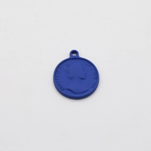 Detailed view of blue Elizabeth II embossed round coin pendant with matte finish