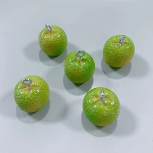 Detailed view of 5 mini green citrus resin pendants with realistic skin texture and rings
