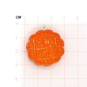 Creative orange resin mooncake pendant with traditional engraving and silver metal loop
