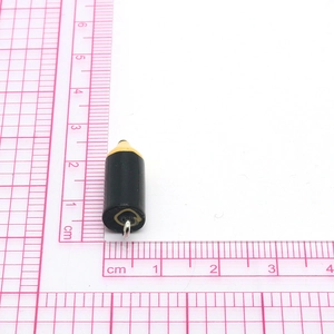 Miniature black and yellow pencil pendant with silver loop for DIY jewelry projects