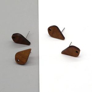Natural wood teardrop stud earrings with metal posts and unique grain texture