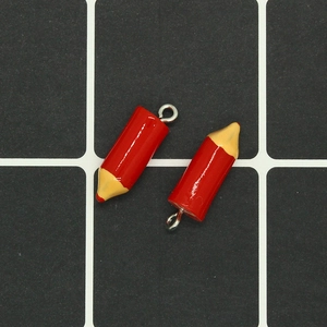 DIY red crayon pencil pendants with silver metal loops for creative jewelry making