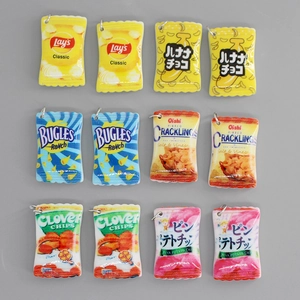 DIY resin miniature snack charms with metal rings featuring various colorful food bag designs