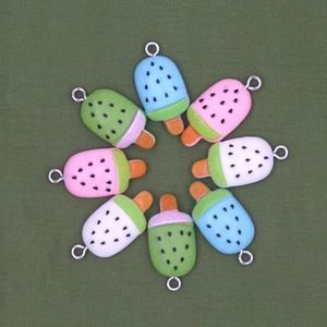 Set of eight colorful resin popsicle charms for DIY jewelry and keychain making