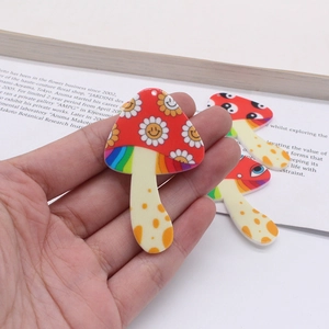 Handheld acrylic mushroom charms with colorful smile daisy and rainbow patterns