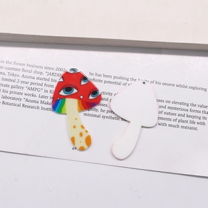 Detailed macro view of creative acrylic mushroom pendants for DIY jewelry making