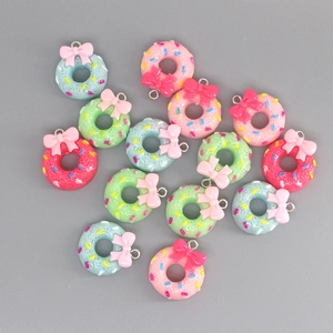 Colorful resin donut pendants with bows and metal loops for DIY jewelry making