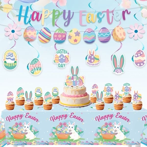 Detailed set of Easter party decorations including blue banner, cake toppers and tablecloth
