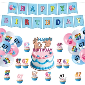67th birthday party set with blue banner, gesture cupcake toppers and colorful balloons