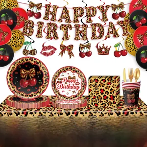 Detail of cherry leopard print party set including plates, cups, and birthday banner