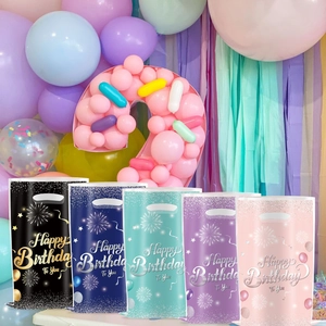Colorful pearl film birthday gift bags set with Happy Birthday text and party balloon background