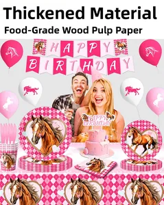 Detailed close-up of pink checkered horse theme paper plates and birthday party tableware