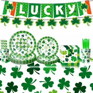 Complete St. Patrick's Day party tableware set with green clover plates and LUCKY banner
