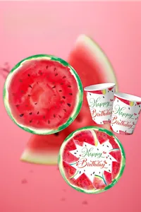 Detail of watermelon theme disposable paper plates and cups with Happy Birthday text