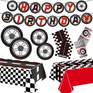 Racing car themed birthday party supplies with tire banners, paper cups and tablecloth