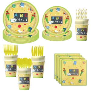 Detailed view of school season disposable tableware set with yellow and green school motifs