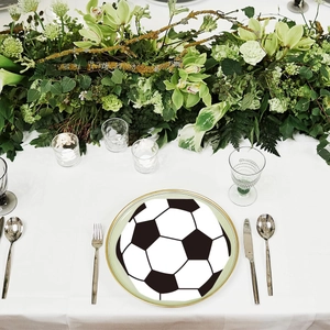 Soccer ball pattern paper napkins for birthday party table decoration with floral background