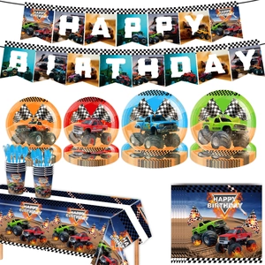 Detail view of Monster Truck birthday party set with banners, plates, and tablecloth