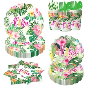 Detailed view of Aloha tropical party set with floral plates, cups, and green cutlery
