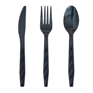 Close-up of black plastic cutlery set with non-slip handles for birthday parties