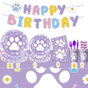 Detail of purple dog paw birthday party set including paper plates and daisy banners